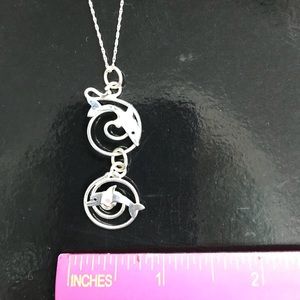 Sterling silver two dolphin necklace on 18” chain
